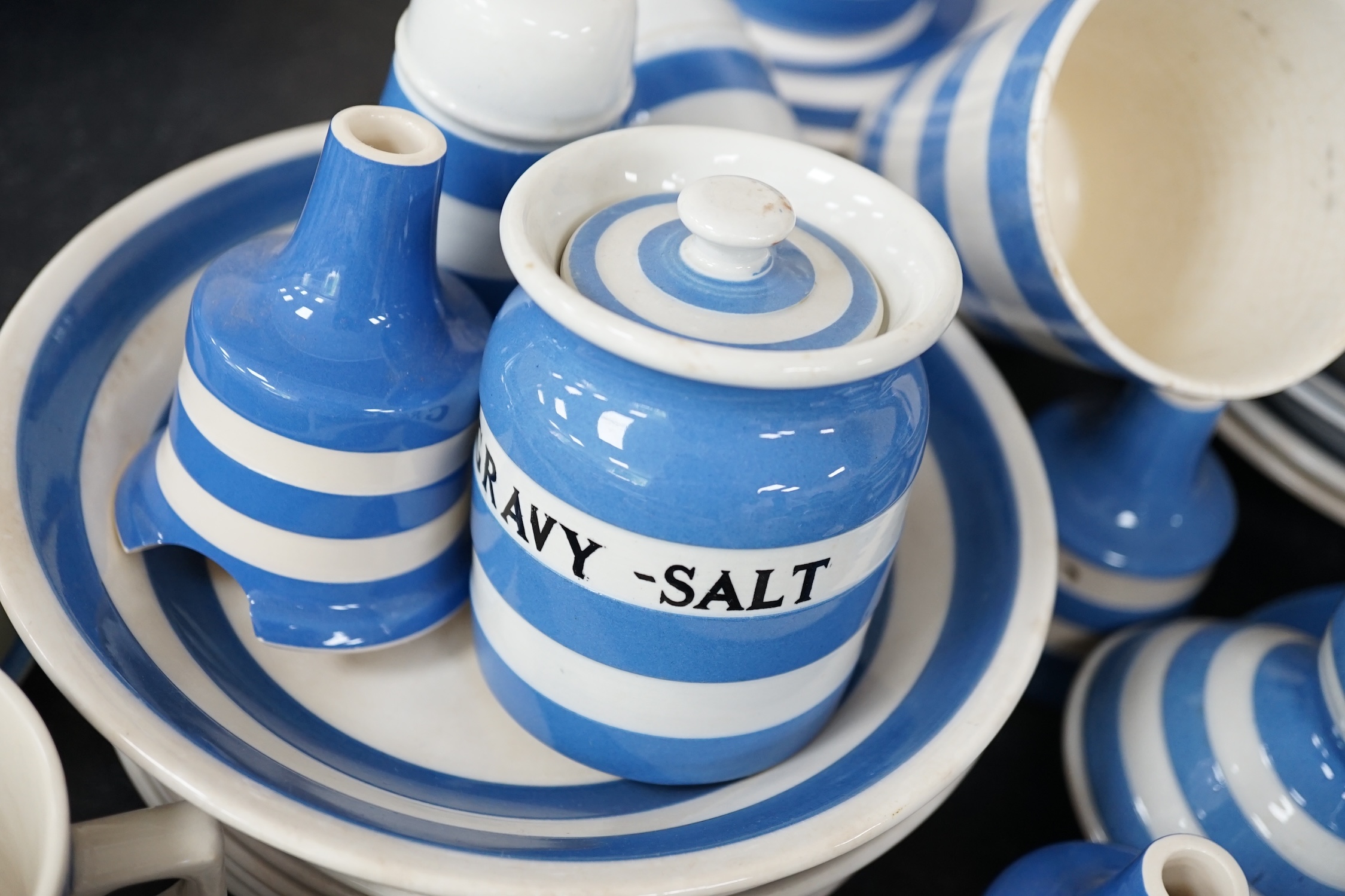 A quantity of unmarked and non T.G.Green blue and white Cornishware to include a Mincemeat jar and cover, egg cups, bowls, dishes and sifters, approximately eighty pieces. Condition - fair to good